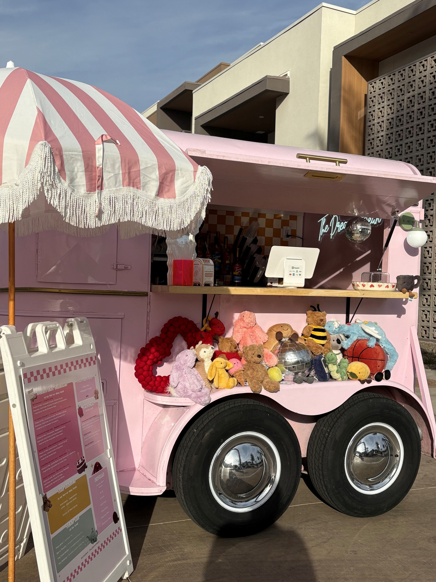 Pink vintage pop-up truck at a resident event at Town Chandler luxury apartments in Chandler, AZ.